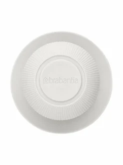 Saippuaa annosteleva tiskiharja